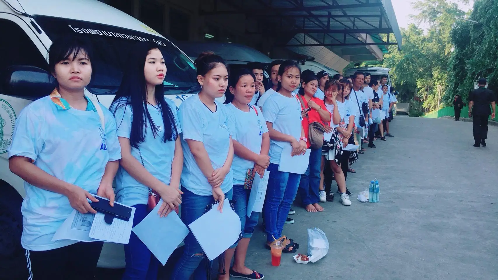 Taking foreign workers for medical checks before visiting the OSS centre